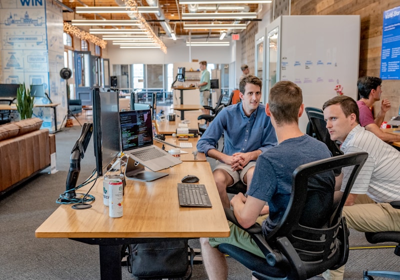 Sales professional presenting client pipeline in a CRM review meeting
